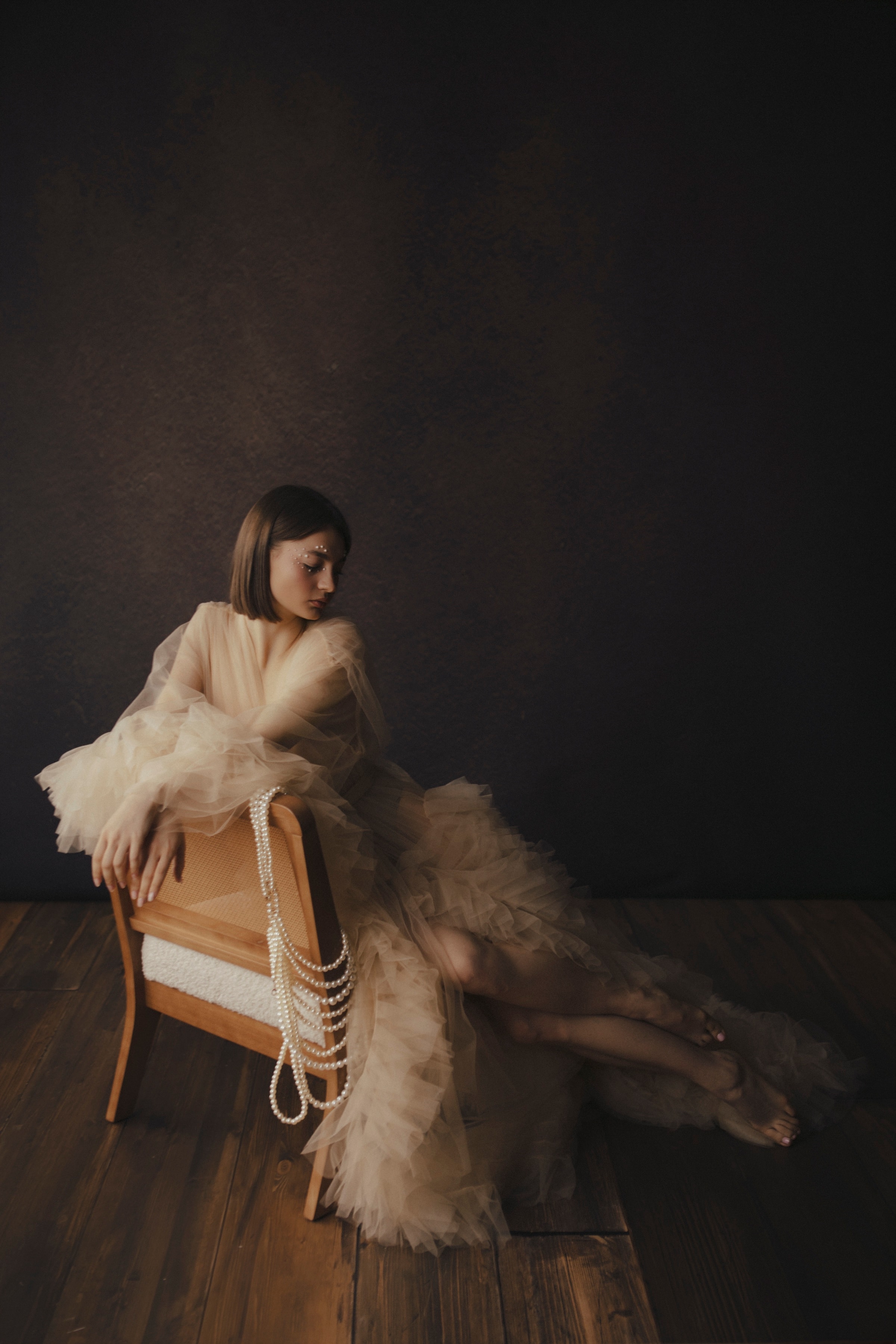 A woman at her Body & Soul reveal, seen, not performing.
